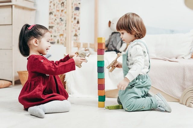 Children stacking blocks